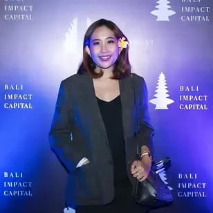 A globe and travel scene representing Chykalophia's roots from Bali to Chicago